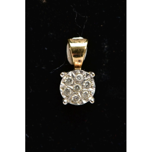 166 - A 9CT GOLD DIAMOND PENDANT, of a circular form, set with seven round brilliant cut diamonds, estimat... 