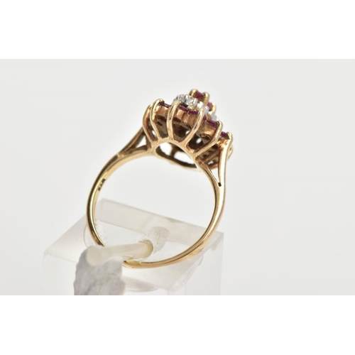 168 - A 9CT GOLD RUBY AND DIAMOND CLUSTER RING, slightly raised cluster of a navette form, set with a cent... 