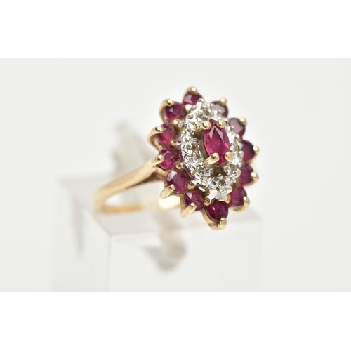 168 - A 9CT GOLD RUBY AND DIAMOND CLUSTER RING, slightly raised cluster of a navette form, set with a cent... 