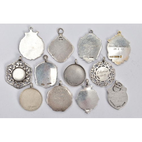 173 - AN ASSORTMENT OF SILVER AND WHITE METAL MEDALS AND PENDANTS, to include two silver ballroom dancing ... 