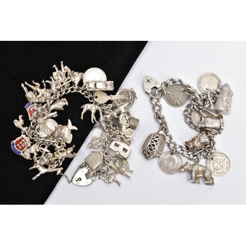 180 - TWO SILVER CHARM BRACELETS AND CHARMS, a curb link bracelet fitted with a heart padlock, hallmarked ... 