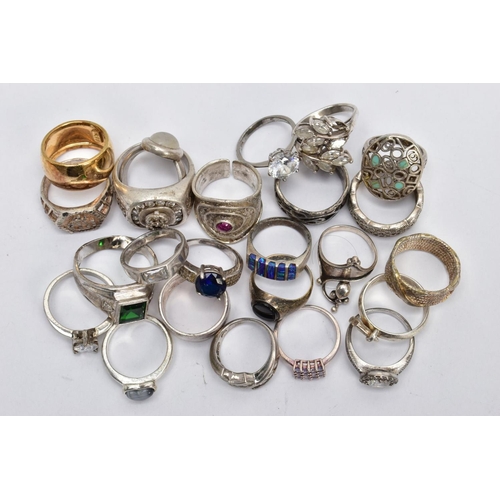 194 - AN ASSORTEMENT OF WHITE METAL RINGS, to include a large silver signet ring set with colourless stone... 