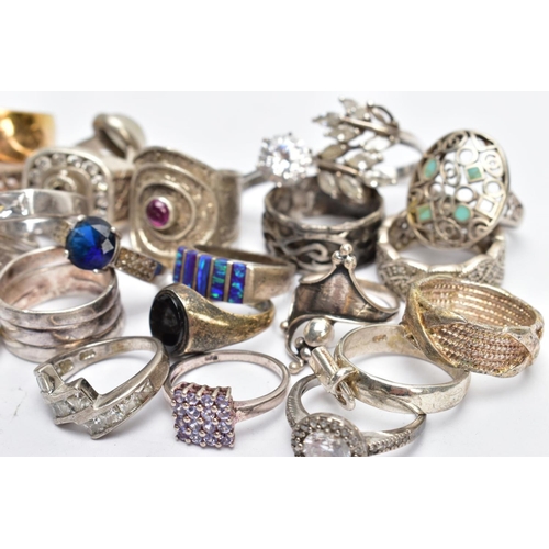 194 - AN ASSORTEMENT OF WHITE METAL RINGS, to include a large silver signet ring set with colourless stone... 