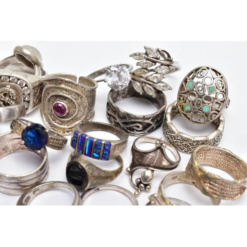 194 - AN ASSORTEMENT OF WHITE METAL RINGS, to include a large silver signet ring set with colourless stone... 