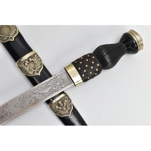 195 - A MODERN SCOTTISH PIPERS DIRK, nickel crown pommel set into a basket weave carved ebonised and brass... 