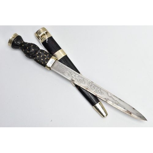 195 - A MODERN SCOTTISH PIPERS DIRK, nickel crown pommel set into a basket weave carved ebonised and brass... 