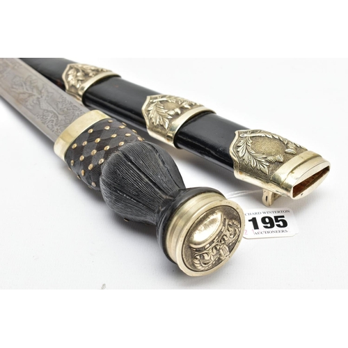 195 - A MODERN SCOTTISH PIPERS DIRK, nickel crown pommel set into a basket weave carved ebonised and brass... 