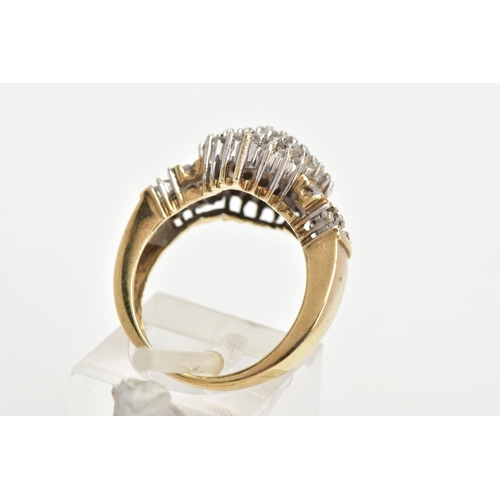 199 - A DIAMOND CLUSTER RING,a yellow metal diamond cluster ring,  tapered shoulders to a plain polished b... 