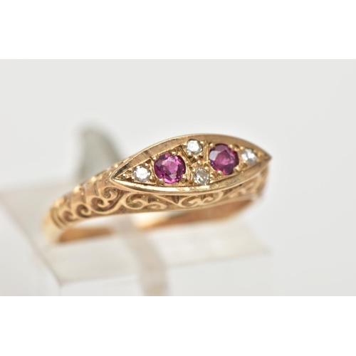 28 - A 9CT GOLD RUBY AND DIAMOND BOAT RING, a navette shaped ring set with two circular cut ruby stones, ... 