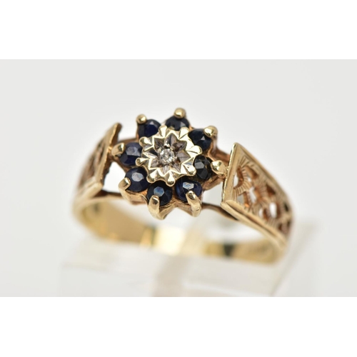 30 - A SAPPHIRE AND DIAMOND CLUSTER RING, four circular cut sapphires surrounding a round brilliant cut d... 