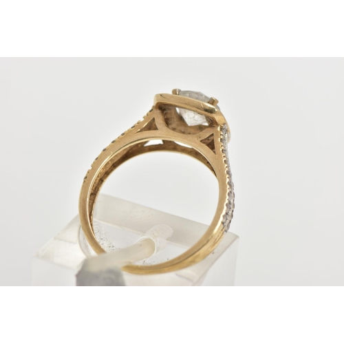 33 - A 9CT GOLD CUBIC ZIRCONIA RING,  a circular cut cubic zirconia, set within a squared halo of circula... 