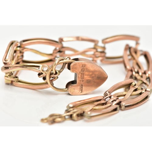 38 - A 9CT ROSE GOLD GATE BRACELET,  an AF fancy link rose gold gate bracelet, white solder marks apparen... 