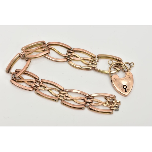 38 - A 9CT ROSE GOLD GATE BRACELET,  an AF fancy link rose gold gate bracelet, white solder marks apparen... 