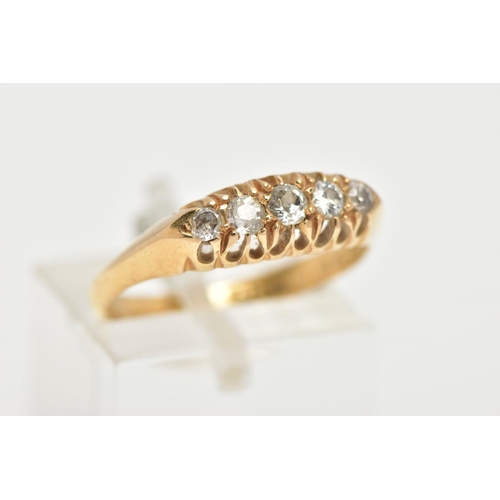 44 - AN EARLY 20TH CENTURY 18CT GOLD DIAMOND RING, set with five old cut graduated diamonds, approximate ... 