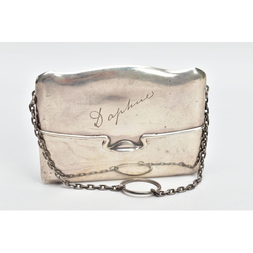 46 - AN EARLY 20TH CENTURY SILVER PURSE, a hard silver purse with a spring hinged fold, engraved with the... 