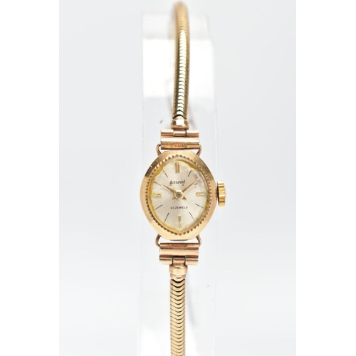 48 - A LADYS 9CT GOLD WRISTWATCH, movement in need of some attention, oval silver dial signed 'Accurist' ... 