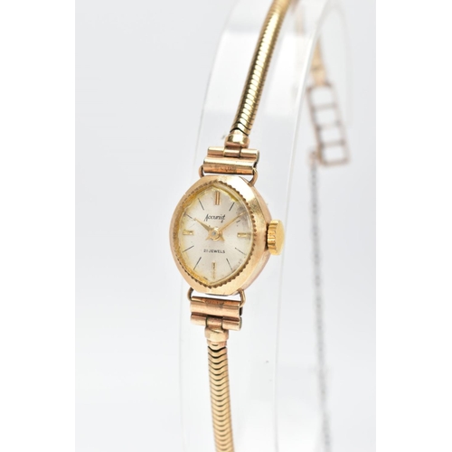 48 - A LADYS 9CT GOLD WRISTWATCH, movement in need of some attention, oval silver dial signed 'Accurist' ... 