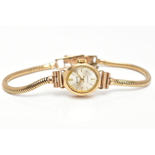 48 - A LADYS 9CT GOLD WRISTWATCH, movement in need of some attention, oval silver dial signed 'Accurist' ... 