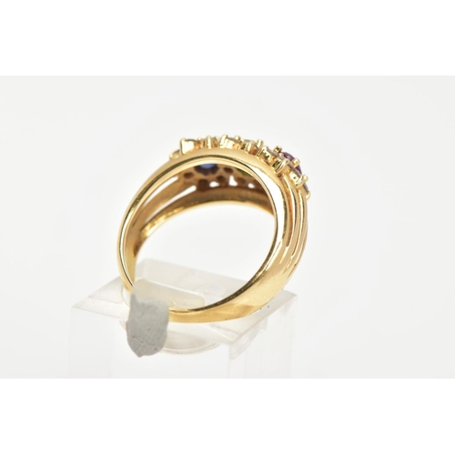 63 - AN 18CT GOLD MUTLI GEM SET RING, designed with an oval cut ruby, emerald and blue sapphire, each wit... 