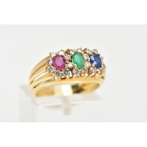 63 - AN 18CT GOLD MUTLI GEM SET RING, designed with an oval cut ruby, emerald and blue sapphire, each wit... 