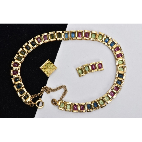 64 - A YELLOW METAL MULTI GEM SET LINE BRACELET, designed with square links each set with alternating ova... 