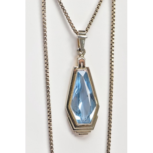 65 - A PENDANT NECKLACE, the pendant of an art deco style set with a light blue fancy cut stone assessed ... 