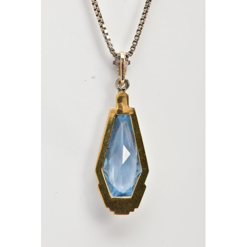 65 - A PENDANT NECKLACE, the pendant of an art deco style set with a light blue fancy cut stone assessed ... 