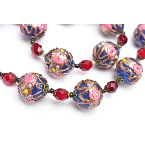 67 - A VENETIAN GLASS BEAD NECKLACE AND A FRAMED THREE GRACES CAMEO, the necklace fitted with thirteen bl... 