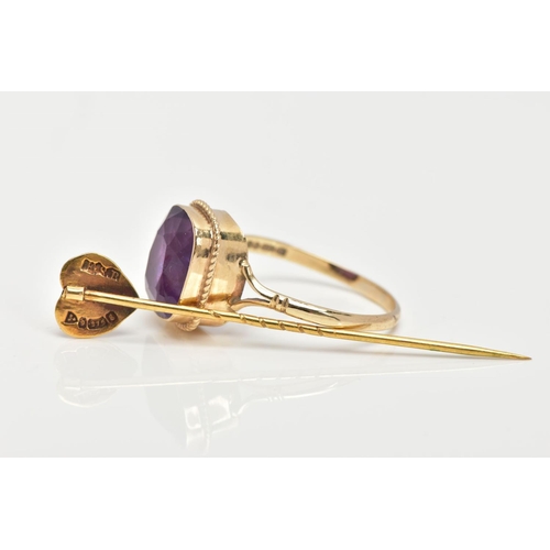 73 - A 9CT GOLD AMETHYST RING AND A STICK PIN, the ring designed with a cushion cut amethyst, collet moun... 