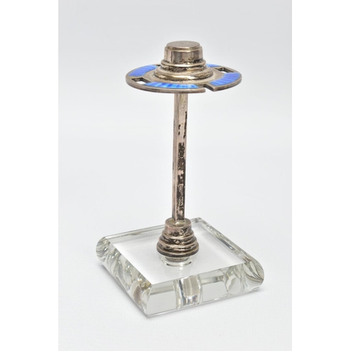 91 - A 1930S SILVER ENAMEL MANICURE STAND,  a circular silver stand with blue guilloche enamel detail and... 