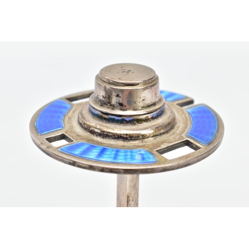 91 - A 1930S SILVER ENAMEL MANICURE STAND,  a circular silver stand with blue guilloche enamel detail and... 