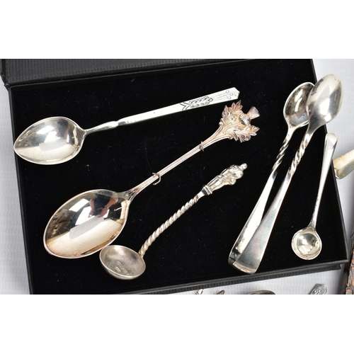 98 - AN ASSORTMENT OF SILVER SPOONS AND SUGAR TONGS, to include a set of six teaspoons with apostles to e... 