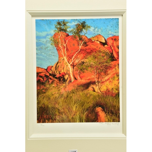 427 - ROLF HARRIS (AUSTRALIAN 1930) 'SUN ON DEVIL'S MARBLES', a limited edition print of an Australian lan... 