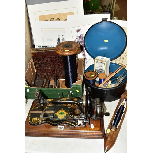 692 - SEWING ACCESSORIES ETC, to include a Varley & Wolfenden Family sewing machine, box of seven reels of... 