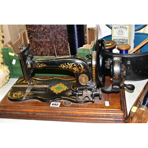 692 - SEWING ACCESSORIES ETC, to include a Varley & Wolfenden Family sewing machine, box of seven reels of... 