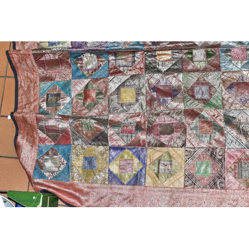 696 - A PATCHWORK BEDSPREAD, Thai silk style decoration, approximate size 266cm x 214cm, good overall cond... 