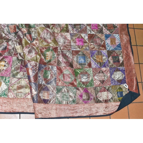 696 - A PATCHWORK BEDSPREAD, Thai silk style decoration, approximate size 266cm x 214cm, good overall cond... 