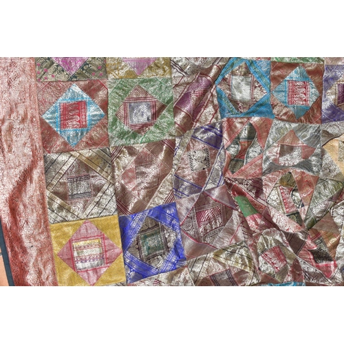 696 - A PATCHWORK BEDSPREAD, Thai silk style decoration, approximate size 266cm x 214cm, good overall cond... 