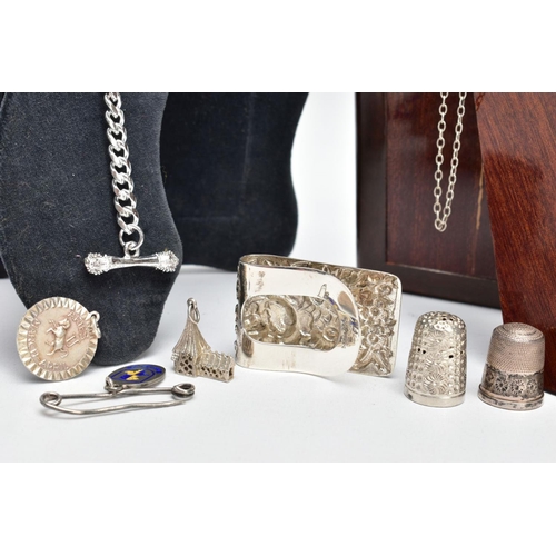 99 - TWO SILVER PHOTO FRAMES AND AN ASSORTMENT OF SILVER AND WHITE METAL JEWELLERY, the first frame featu... 