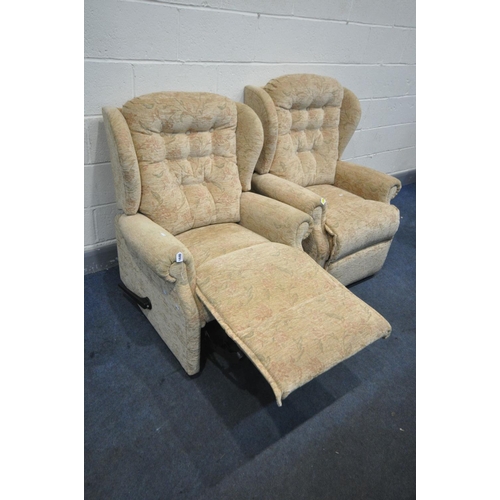 1646 - A PAIR OF FLORAL BIEGE UPHOLSTERED MANUAL RECLINING ARMCHAIRS