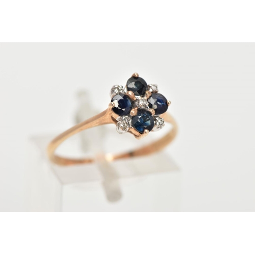 31 - A 9CT GOLD SAPPHIRE AND DIAMOND RING, four circular cut blue sapphires set with five round brilliant... 