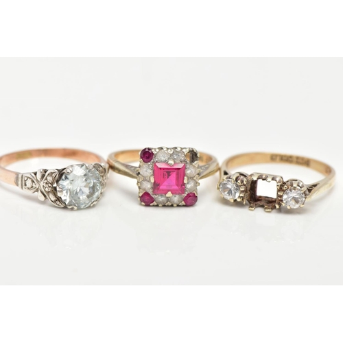 43 - A 9CT GOLD RING AND TWO YELLOW METAL RINGS, pink and colourless paste set in a 9ct gold mount, hallm... 