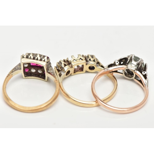 43 - A 9CT GOLD RING AND TWO YELLOW METAL RINGS, pink and colourless paste set in a 9ct gold mount, hallm... 