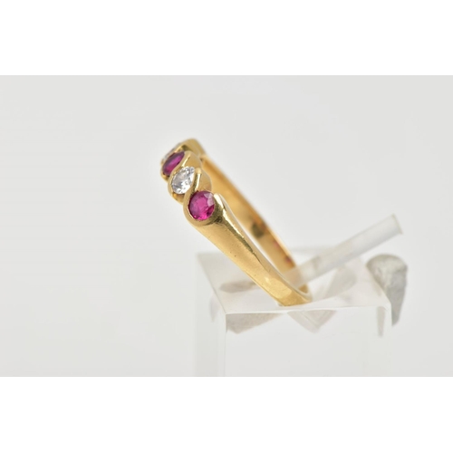 49 - AN 18CT GOLD RUBY AND DIAMOND HALF ETERNITY RING, designed with three circular cut rubies, interspac... 