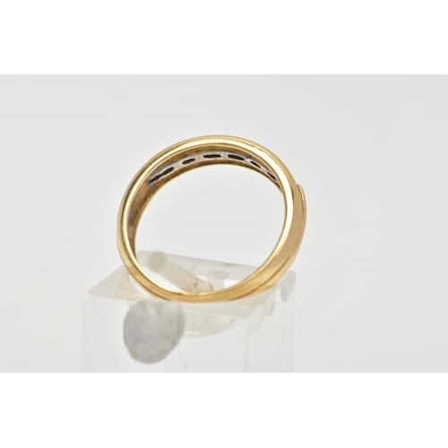 52 - AN 18CT GOLD DIAMOND HALF ETERNITY RING, designed with a row of channel set round brilliant cut diam... 