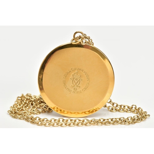 57 - A ROYAL CROWN DERBY BONE CHINA PENDANT AND 9CT GOLD CHAIN, the gold-plated pendant of a circular for... 