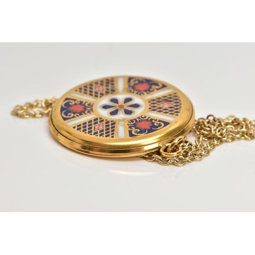 57 - A ROYAL CROWN DERBY BONE CHINA PENDANT AND 9CT GOLD CHAIN, the gold-plated pendant of a circular for... 