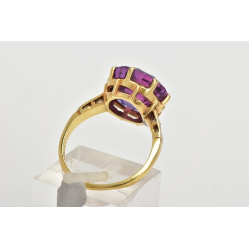 67 - A YELLOW METAL SYNTHETIC SAPPHIRE RING, designed with a circular cut synthetic colour change sapphir... 