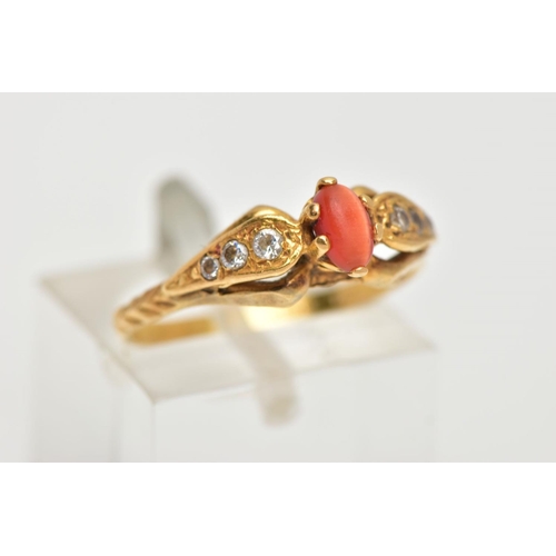 70 - A 22CT GOLD GEM SET RING, set with a central oval cats eye chrysoberyl, six claw setting, flanked wi... 