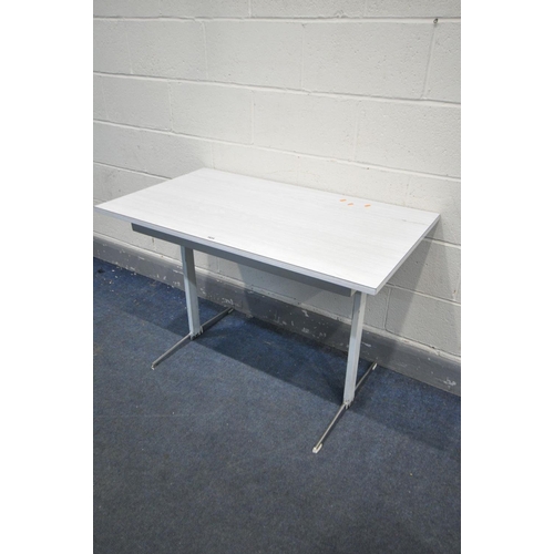 1634 - A FORMICA TOPPED TABLE, on a metal base, width 107cm x depth 60cm x height 72cm